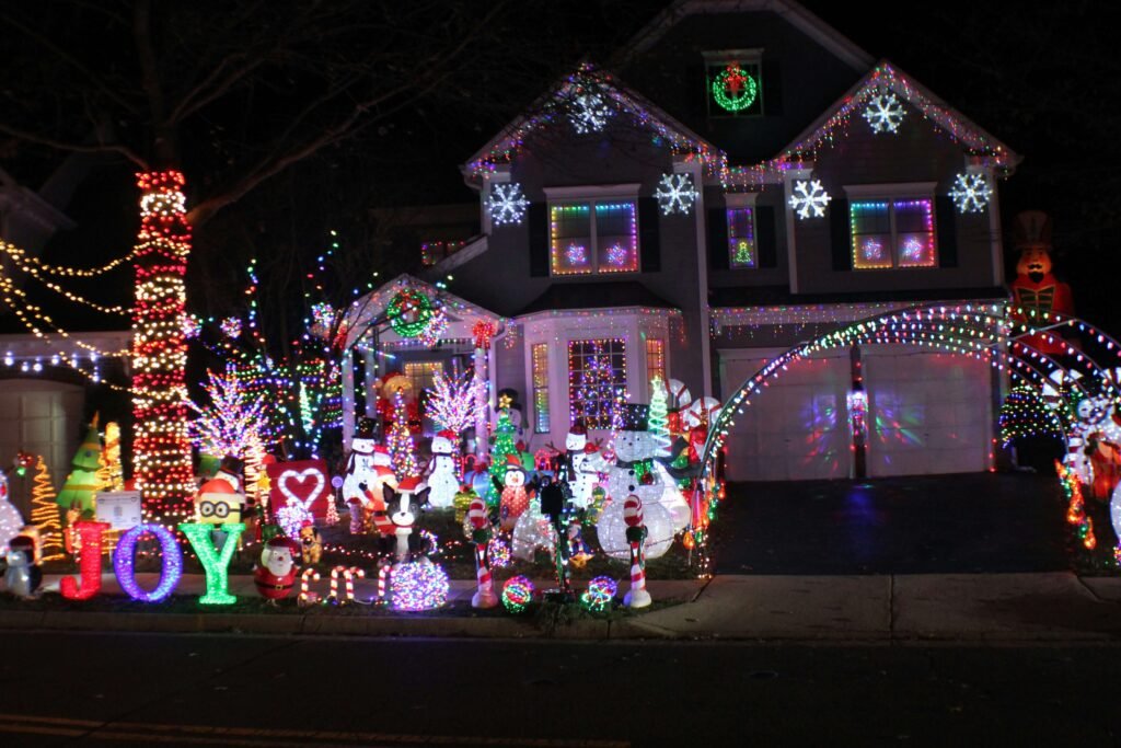House with elaborate Christmas lights display, possibly requiring tree trimming Richmond Texas.